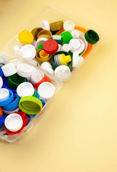 Sort Plastic Bottle Caps Recycling Zero Waste Yellow Background Place — Stock Photo, Image