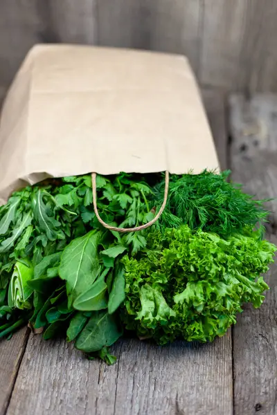 Fresh Greens Paper Bag Green Onions Dill Parsley Spinach Arugula — Stock Photo, Image
