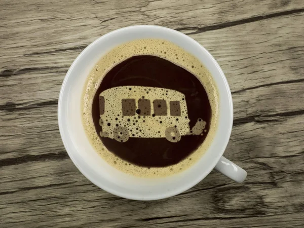 Autobús en taza de café — Foto de Stock