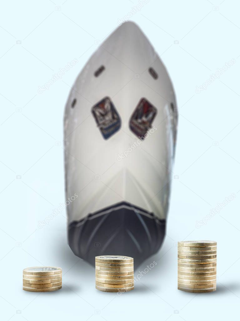coin stacks in front of a ship