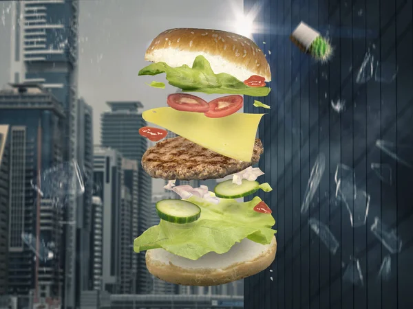 Fast food burger falls from a high rise — Stock Photo, Image