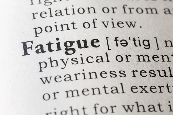 Dictionary definition of fatigue — Stock Photo, Image