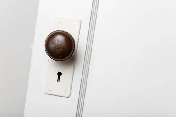 Old wooden door with door knob — Stock Photo, Image