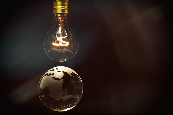 Light bulb and earth