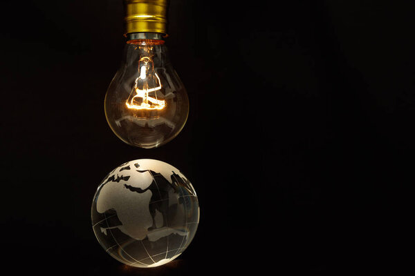 Light bulb and earth