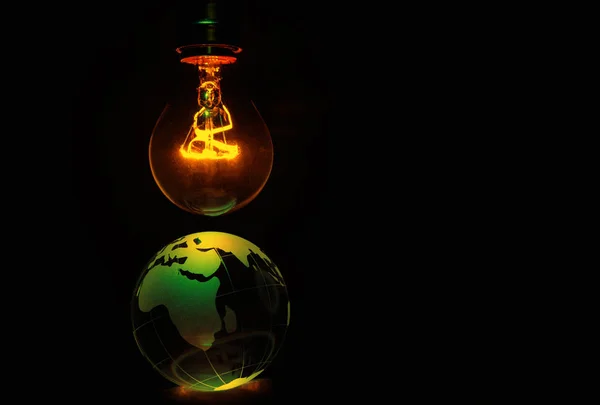 Light bulb and earth