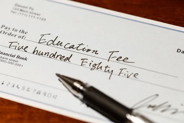 Cheque for education fee — Stock Photo, Image