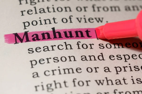 Definition av manhunt — Stockfoto