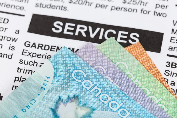 Canadian dollar and services — Stock Photo, Image