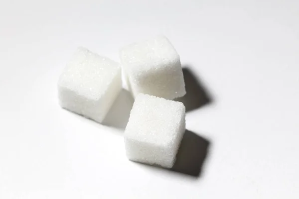 Cubos de azúcar blanco —  Fotos de Stock
