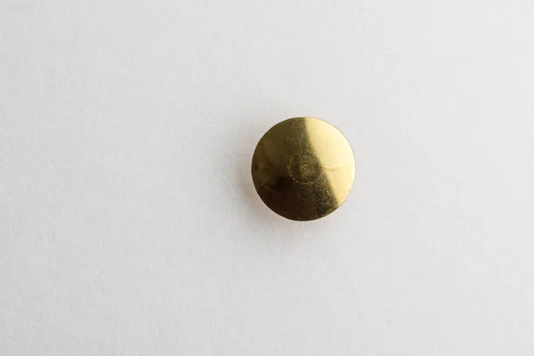 Golden Thumb Tack head — Stock Photo, Image