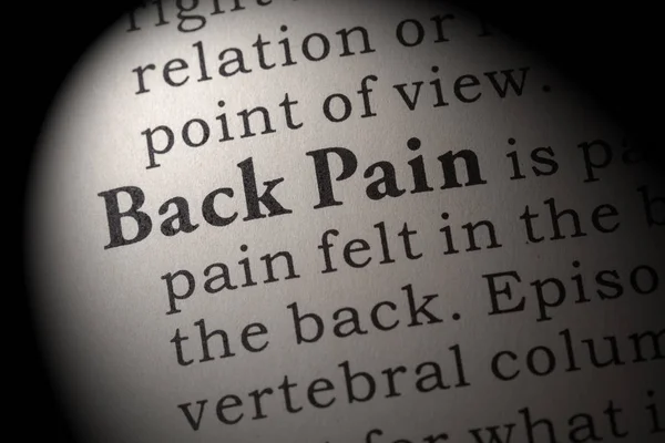 Определение боли в спине — стоковое фото