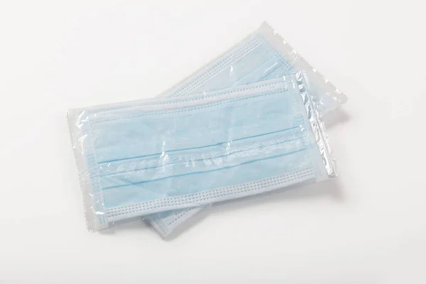 Blu Maschere Chirurgiche Monouso Con Sfondo Bianco — Foto Stock