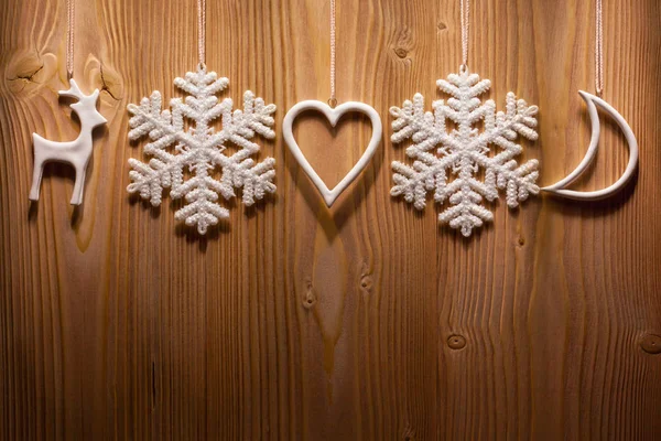 Christmas decorations against wooden background. — Stock Photo, Image