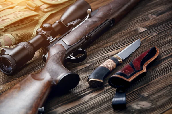 Hunting equipment on old wooden background. — Stock Photo, Image