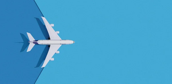 Miniatuur speelgoed vliegtuig op kleurrijke papieren achtergrond. Platte lay ontwerp van het reisconcept met vliegtuig op blauwe lucht. — Stockfoto