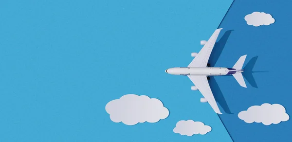 Miniature toy airplane on colorful paper background. Flat lay design of travel concept with plane and clouds on blue sky.