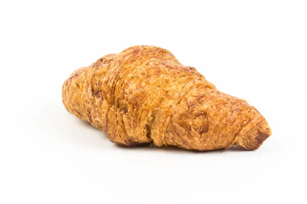 Croissant na białym tle — Zdjęcie stockowe