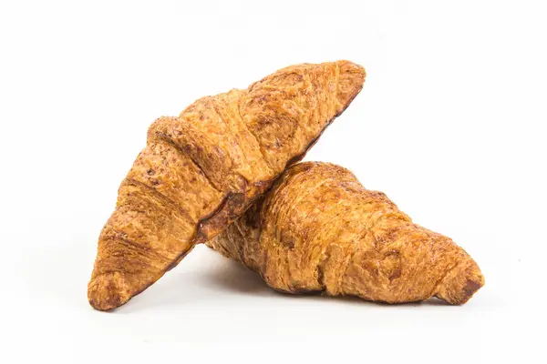 Croissant na białym tle — Zdjęcie stockowe