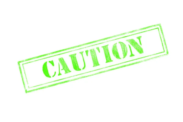 'CAUTION' rubber stamp over a white background — Stock Photo, Image