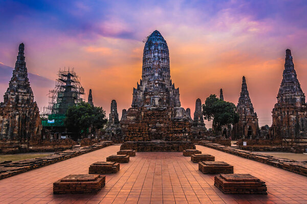 Buddha decay , THAILAND Ruins and Antiques at the Ayutthaya Historical Park , in evening time 