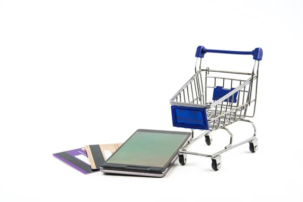 Smart phone with shopping cart on white background , Means shopp — Stock Photo, Image