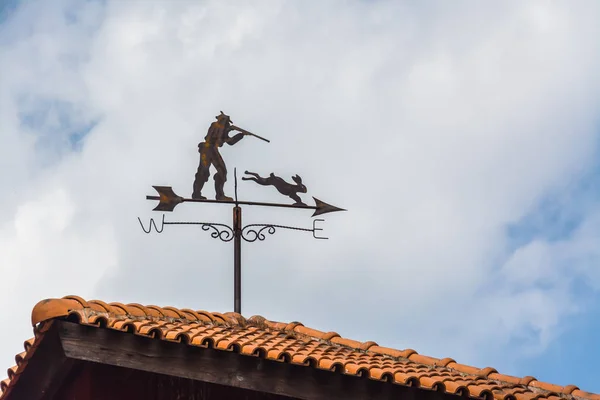 weather vane on the roof