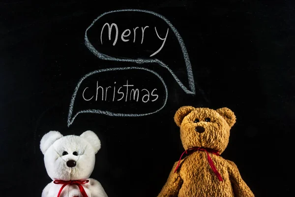 Teddybär mit Botschaft "Frohe Weihnachten " — Stockfoto