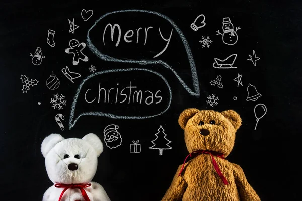 Teddybär mit Botschaft "Frohe Weihnachten " — Stockfoto