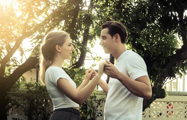 Dancing couple  in the garden . Romantic couple at garden . Happ