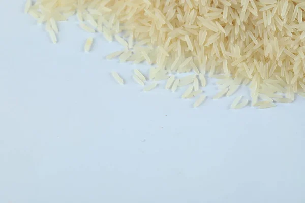 Dry and fresh asian rice stock on the corner of the marble — Stock Photo, Image