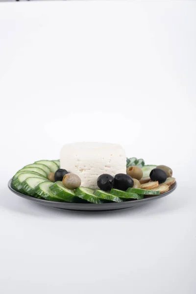 Cucumber, olives and white cheese — Stock Photo, Image