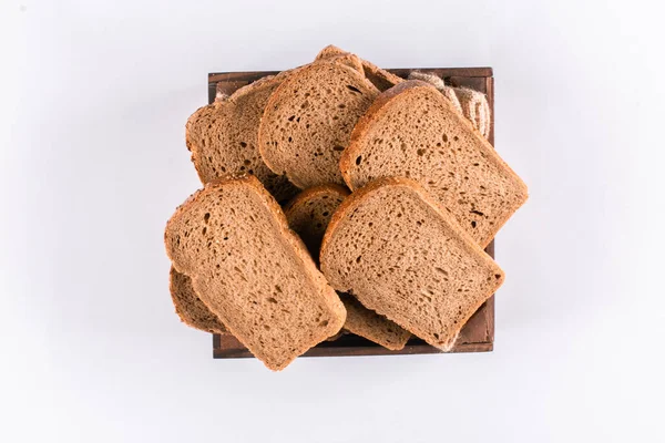 Krajíc chleba na stůl — Stock fotografie