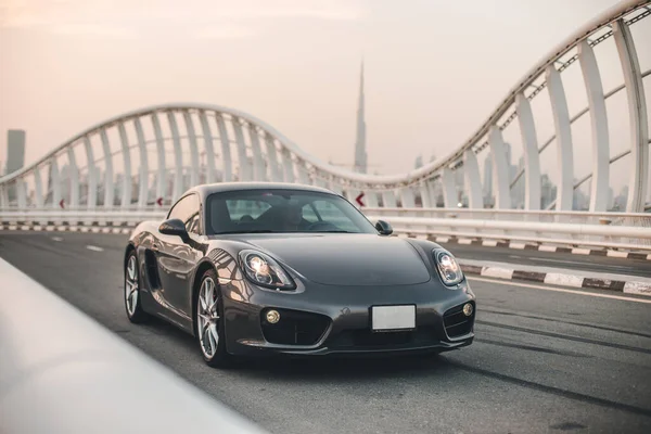 Black sport model car in a design bridge — Stock Photo, Image