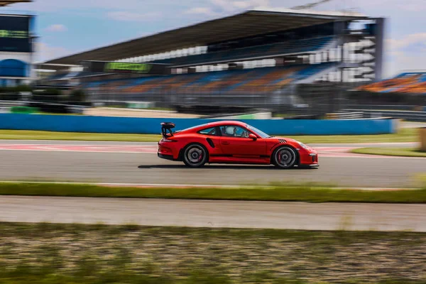 Red sport car racing in the highway — Stock Photo, Image