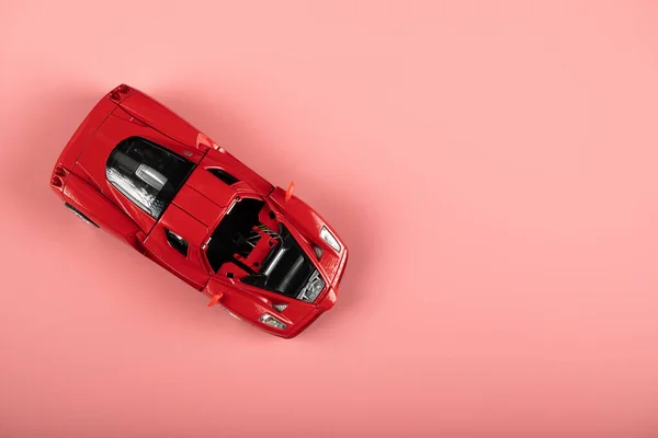 Small red car toy for a kid