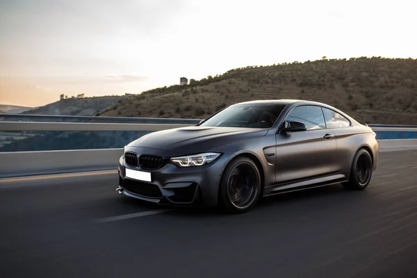 New model black sedan on the rush drive on the freeway — Stock Photo, Image