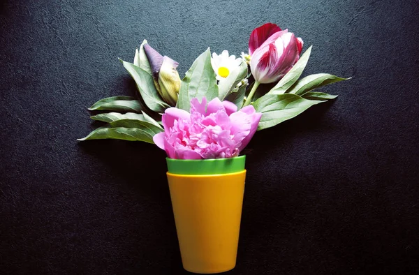 Small bouquet on a black background — Stock Photo, Image