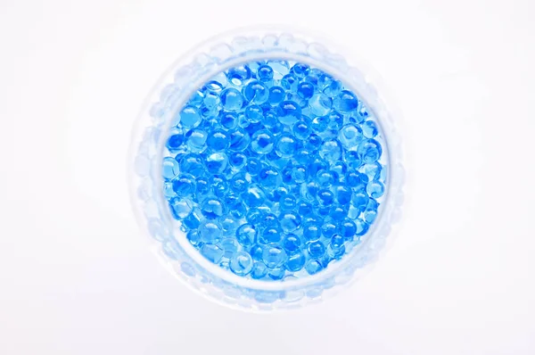 Blue little  balls in a glass, top view — Stock Photo, Image