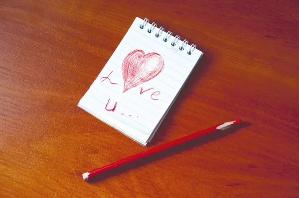 Love note on a table — Stock Photo, Image