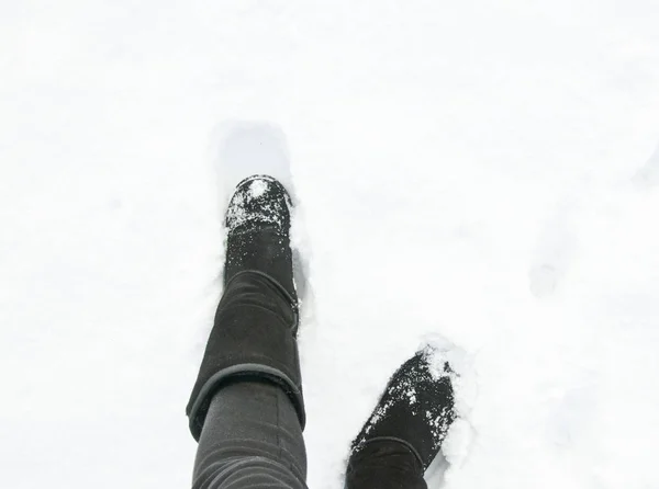 Black uggs in the snow, top — Stock Photo, Image