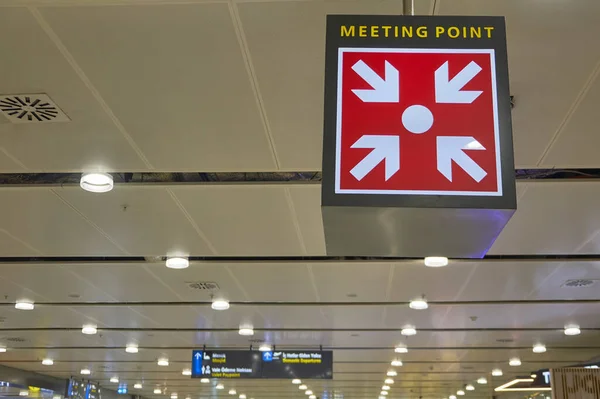 Meeting point sign at the airport hall