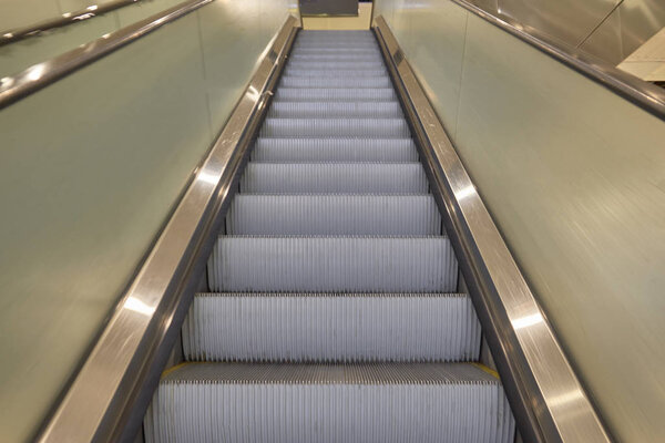 Stairs of escalator. Pedestrian and disabled people facilities