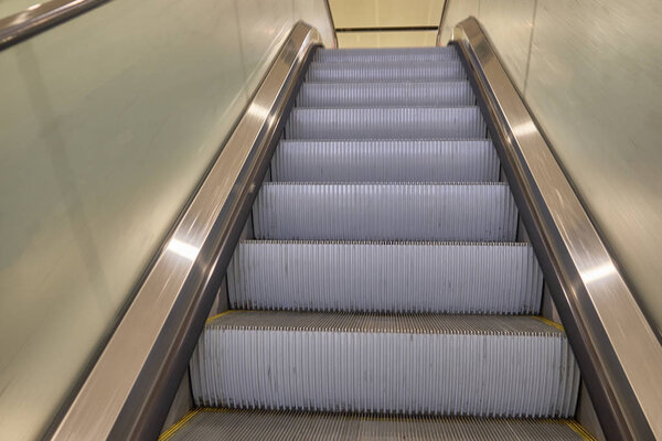 Stairs of escalator. Pedestrian and disabled people facilities