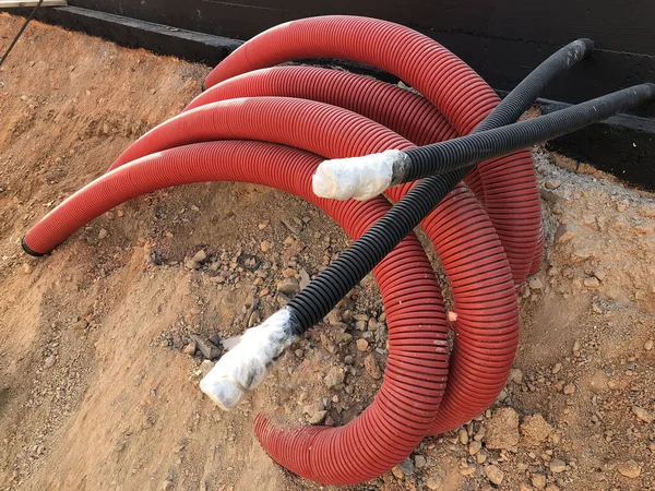 Coiled Corrugated Pipes High Voltage Cables — Stock Photo, Image