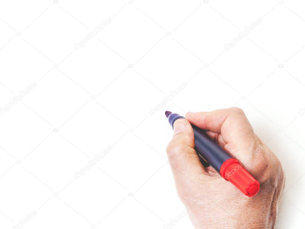 Hand writing with red marker on white background