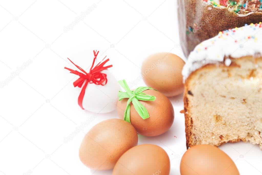 Two Easter and eggs on white background