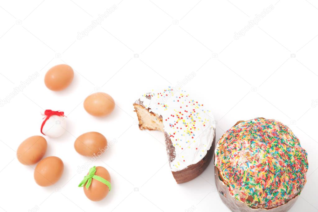 Two Easter and eggs on white background