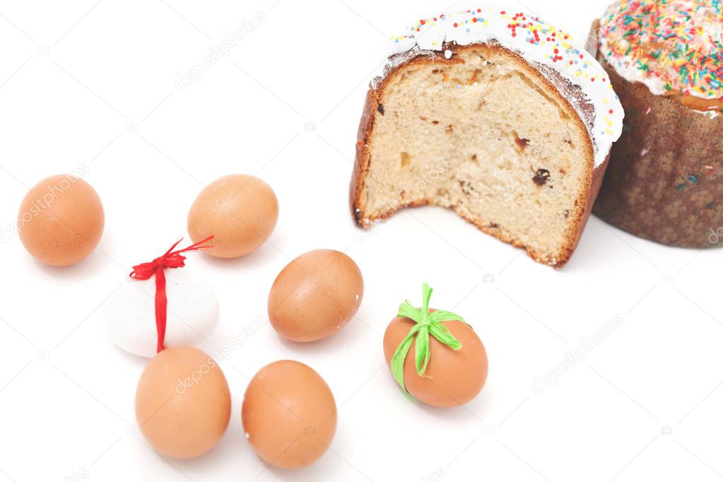 Two Easter and eggs on white background