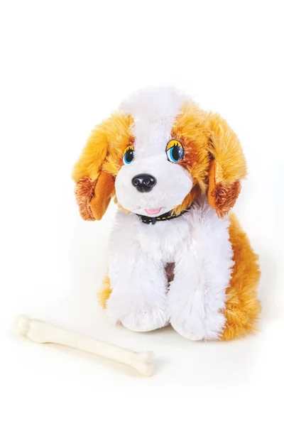 Söt leksak hund på vit bakgrund — Stockfoto